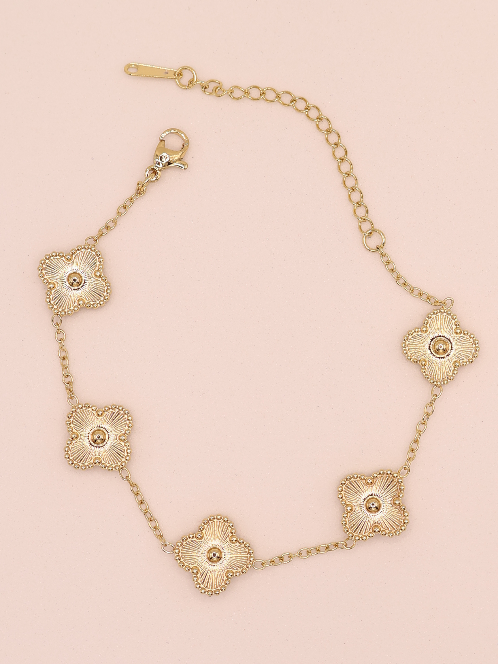 Pulsera de trebol dorada gde
